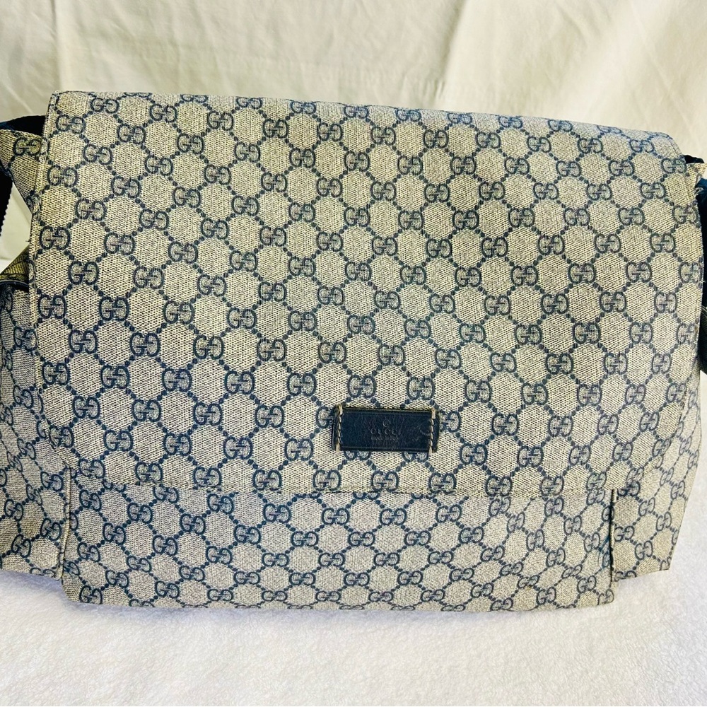 Gucci Navy Insignia diaper bag in dust bag.